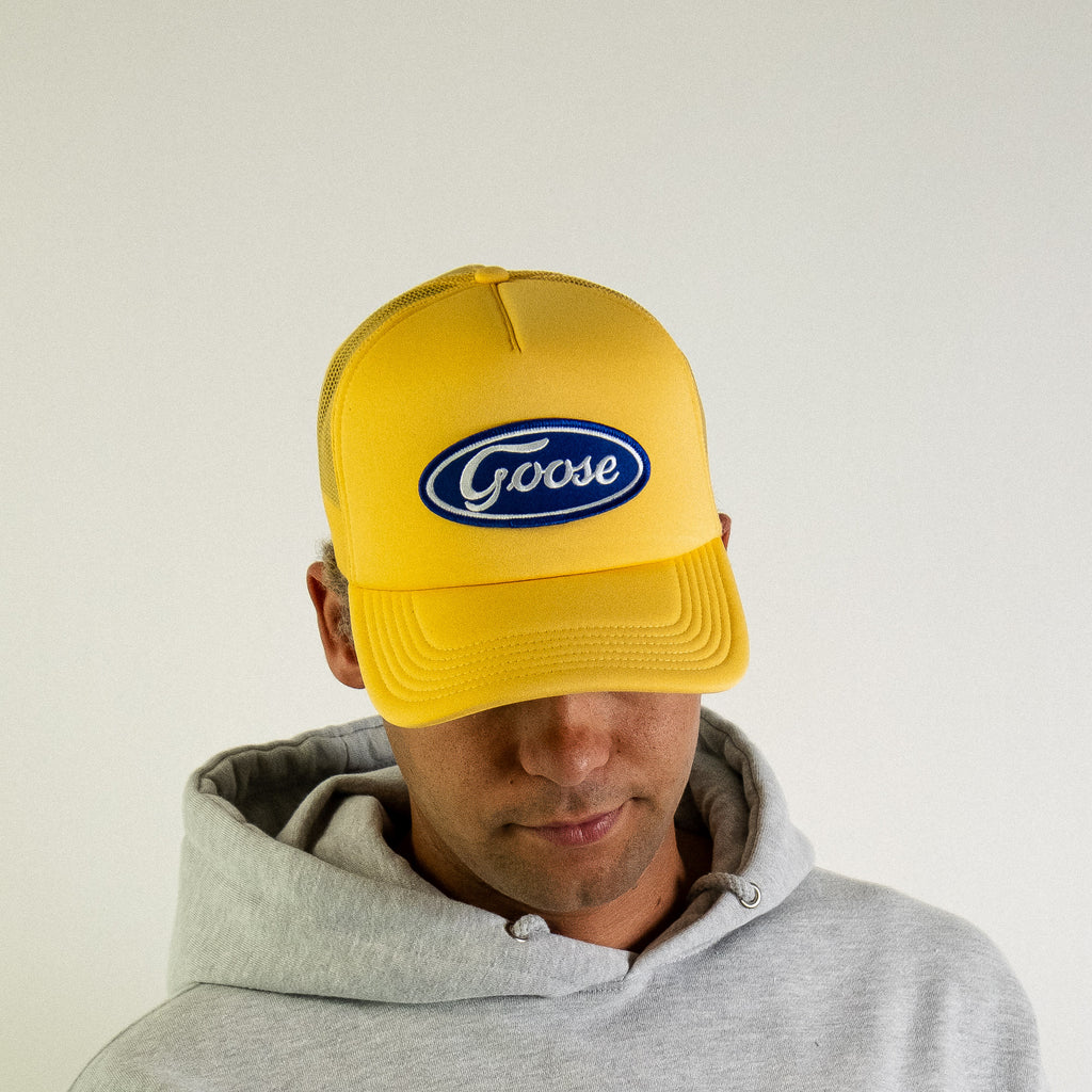 Blue Oval Patch Trucker Hat (Yellow)